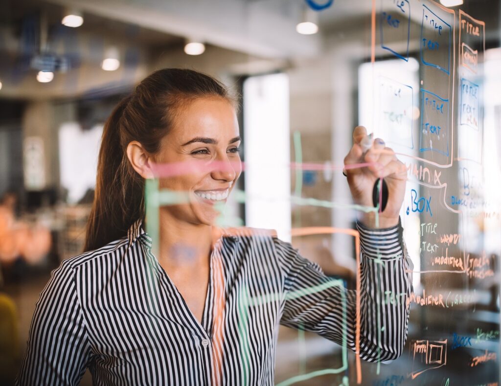 Tech Employee working on improving design of Zedmed practice management software